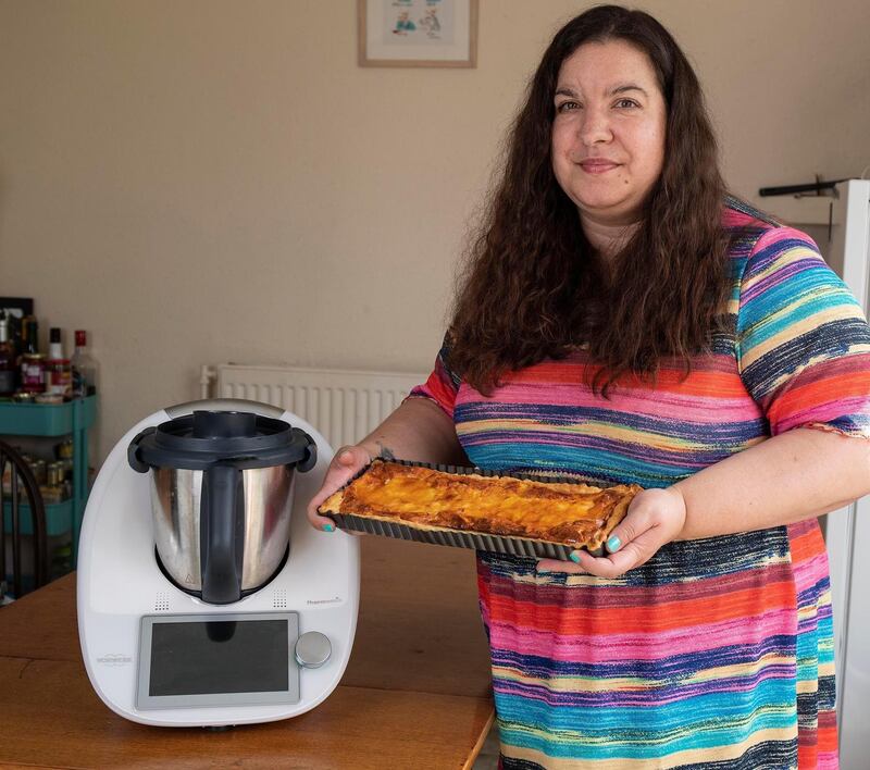 Katia Valadeau at her home in Dublin holding a quiche which she cooked with her Thermomix. Photograph: Damien Eagers