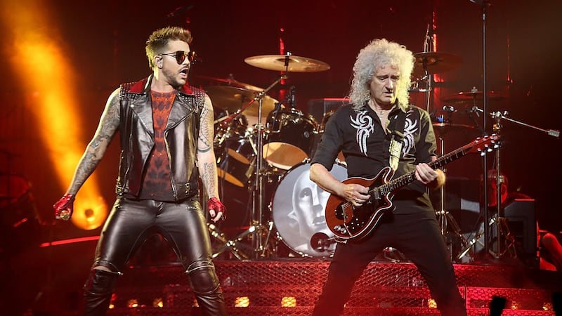 DALLAS, TEXAS - AUGUST 04:  Brian May (R) and Adam Lambert perform in concert with Queen at the American Airlines Center on August 4, 2017 in Dallas, Texas.  (Photo by Gary Miller/Getty Images)