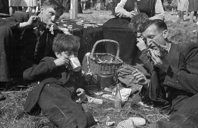 August 1945: Race-goers having a lunchtime picnic at the Galway Races. Photo by Francis Reiss/Picture Post/Hulton Archive/Getty Images