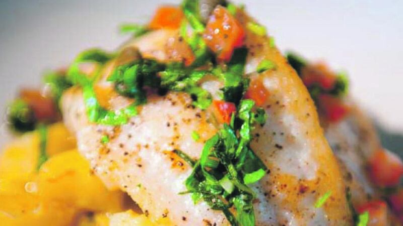 Turbot with crushed potatoes and sauce vierge.