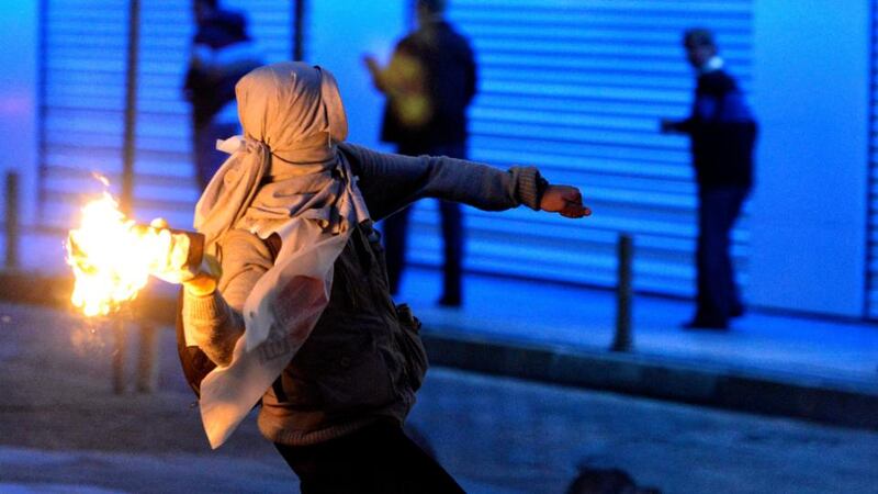 Turkish riot police clash with protestors during a demonstration for the victims of the Soma mine explosion, in Istanbul, Turkey.  Photograph: Erdem Sahin/EPA