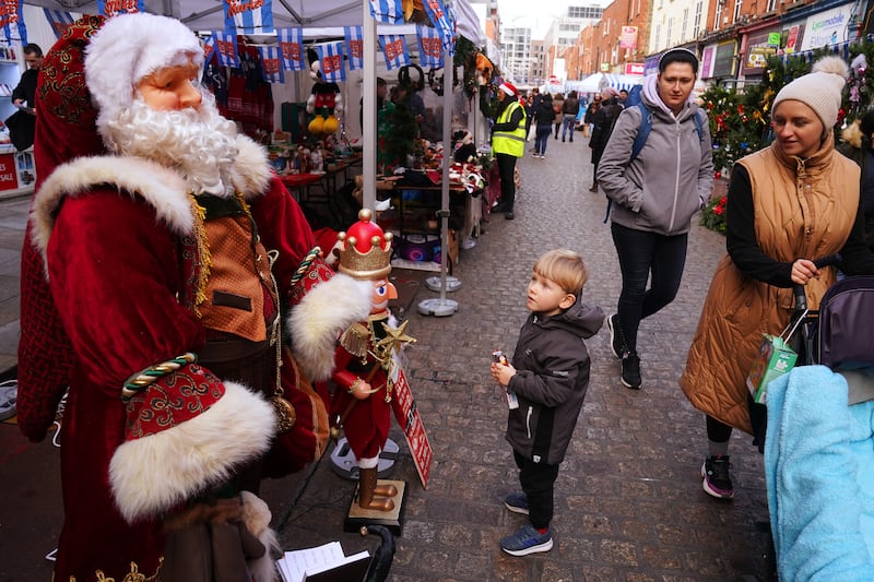 Rather than sticking to tradition, just think about what you actually enjoy doing at Christmas - showing children around the sights in town could be a good place to start. Photograph: Brian Lawless/PA