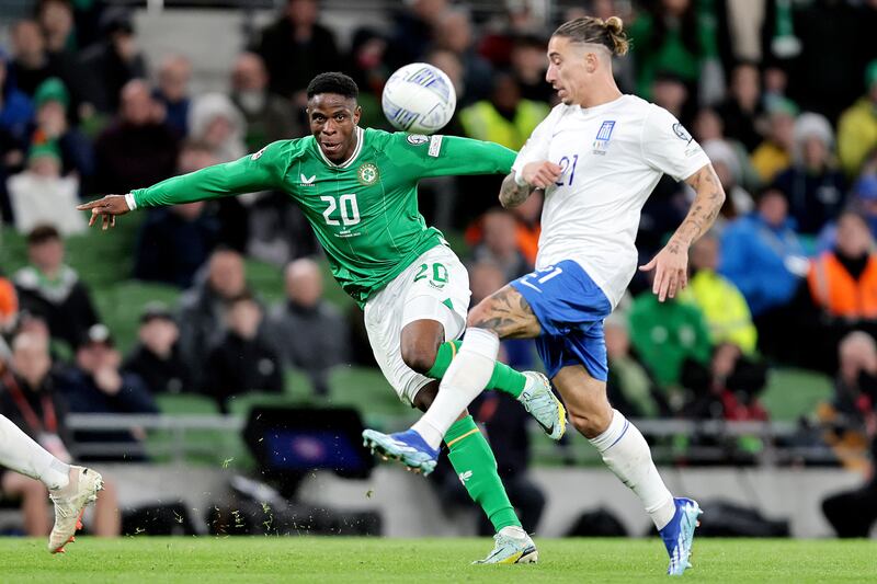 Ireland's Chiedozie Ogbene in action against Greece's Kostas Tsimikas at the Aviva Stadium. Photograph: Laszlo Geczo/Inpho