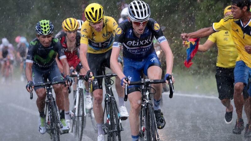 Dan Martin is followed by Chris Froome, wearing the overall leader’s yellow jersey, during the 184.5km ninth stage of the Tour de France. Photograph: Getty.
