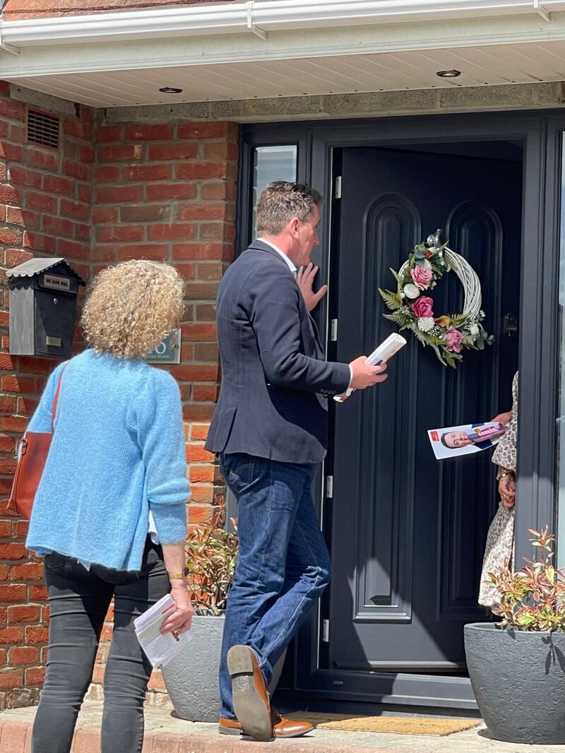 Labour European election candidate Aodhán Ó Ríordáin canvassing in Swords, observed by Irish Times journalist Justine McCarthy.