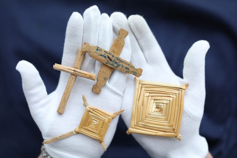 Keeper of the Irish Folklife Division of the National Museum of Ireland Clodagh Doyle holds some of the 21 St Brigid's crosses  from regions throughout Ireland that are now on display at the National Museum of Ireland, Country Life in Turlough Park, Castlebar, Co. Mayo as part of FOLK 21, a new series of events that will run throughout 2022. Photograph : Julien Behal