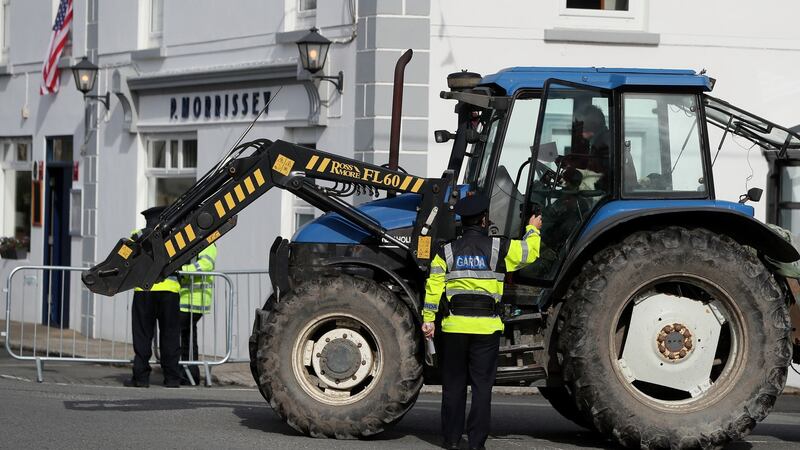 A tractor stops at a Garda checkpoint in Doonbeg in Co Clare during the visit of US president Donald Trump. Photograph: Niall Carson/PA Wire