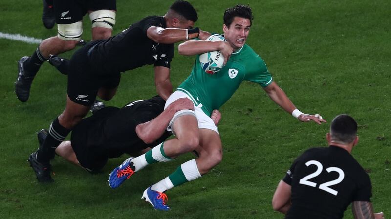 Ireland’s  Joey Carbery  is tackled during the Rugby World Cup quarter-final against New Zealand. Photograph: Behrouz Mehri/AFP via Getty Images