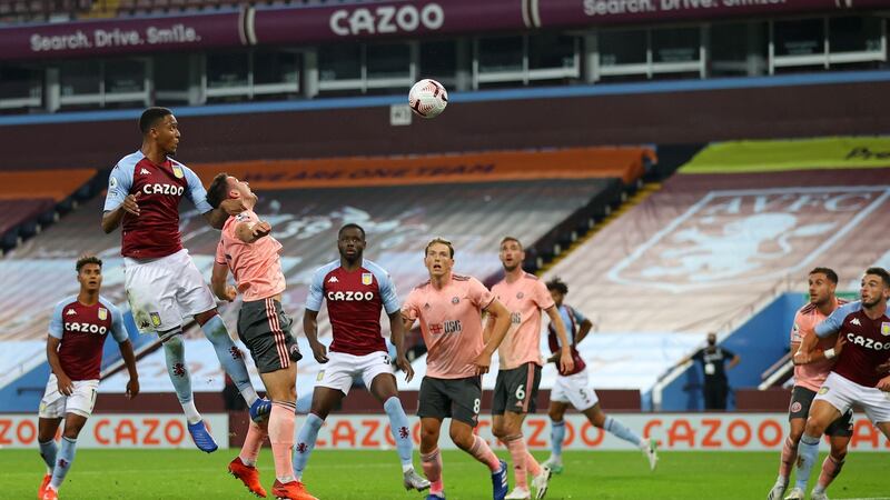 Ezri Konsa leaps to score Aston Villa’s winner against Sheffield United. Photograph: Julian Finney/Getty/AFP