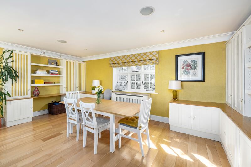 Dining area with built-in storage and desks
