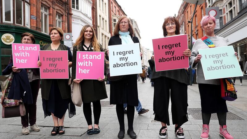 Women from the group Women Hurt gather on Grafton Street, Dublin, to call for a No vote. Photograph:  Brian Lawless/PA