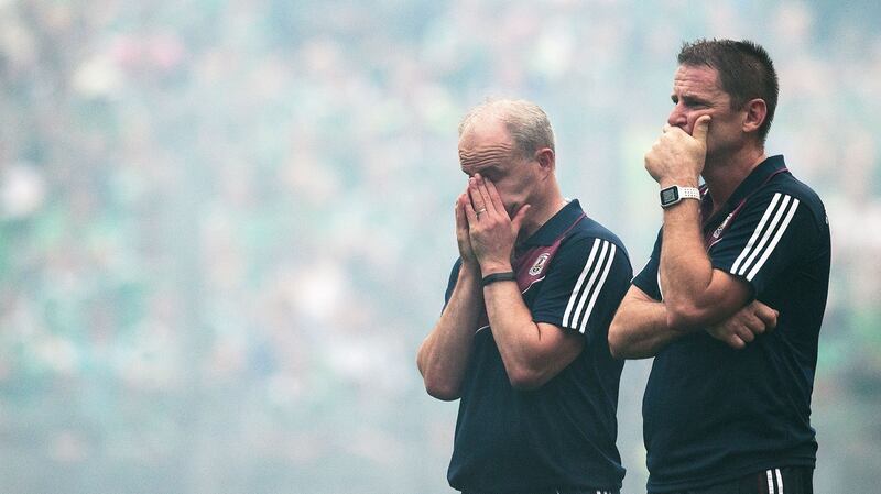 Galway manager Michael Donoghue and selector Noel Larkin after their side’s defeat to Limerick. Photograph: Tommy Dickson/Inpho