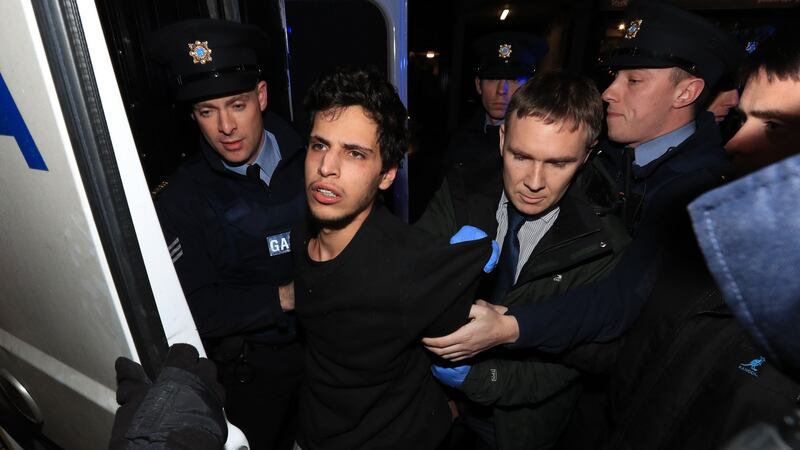 Mohamed Morei (18), being brought into Dundalk District Court this evening where he was charged with the murder of a Japanese national. Photograph: Colin Keegan/Collins Dublin