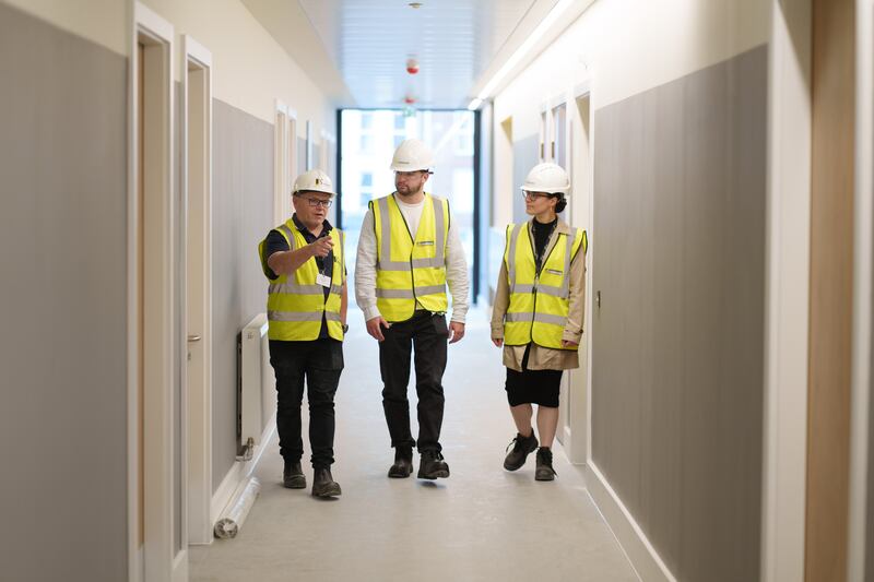 From left are Dublin Simon Community staff Rory O’Moore (property development manager), Jack Lynch (fundraising) and Rachel Camilleri (communications) in the charity’s new facility at Usher’s Island, Dublin. Photograph: Fran Veale