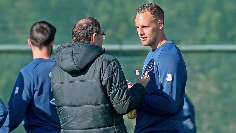 Republic of Ireland manager Martin O’Neill with midfielder David Meyler in Malahide.  Photograph: Donall Farmer / Inpho