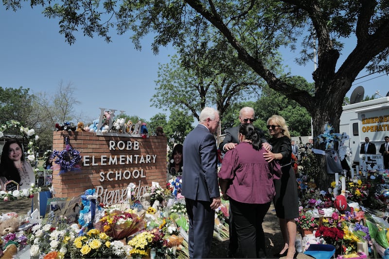 US president Joe Biden and first lady Jill Biden visit the memorial at Robb Elementary School in Uvalde, Texas. Photograph: Cheriss May/The New York Times