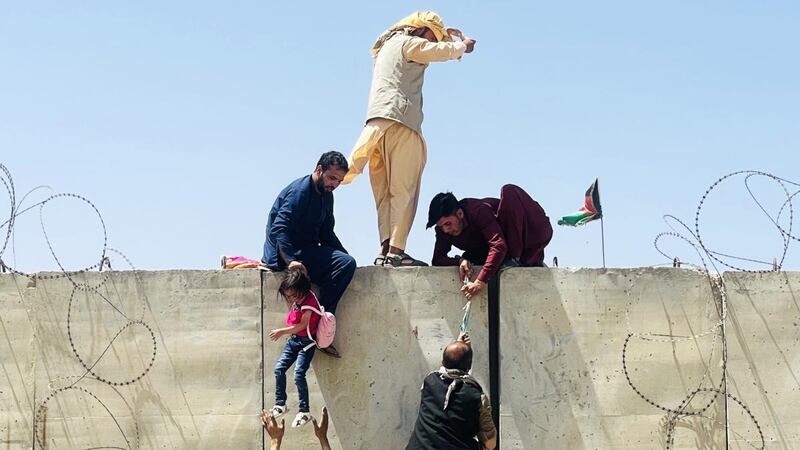 Afghans rush to the airport as they try to flee Kabul. Photograph: Getty Images