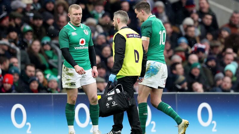Johnny  Sexton leaves the field with a blood injury at Saturday’s Six Nations match against England. Photograph: Billy Stickland/Inpho