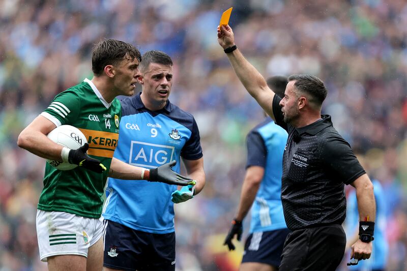 Kerry's David Clifford receives a yellow card from referee David Gough. File photograph: Laszlo Geczo/Inpho