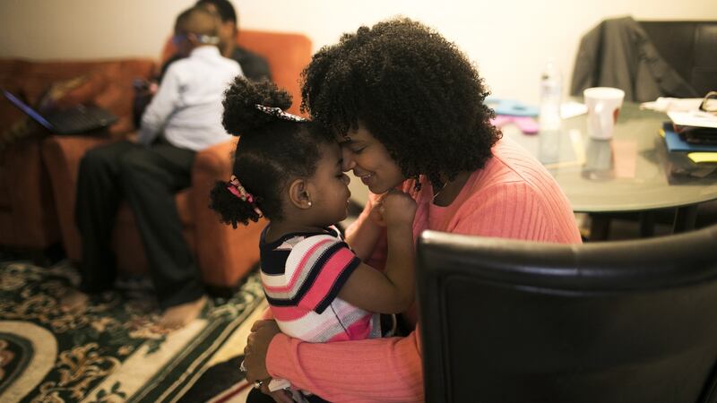 Saffiatu Sillah with her daughter, Jaria Kamara, at home in Philadelphia. After her second child was born, Sillah, a pharmacist, searched for medical help. Photograph: Maddie McGarvey/ The New York Times