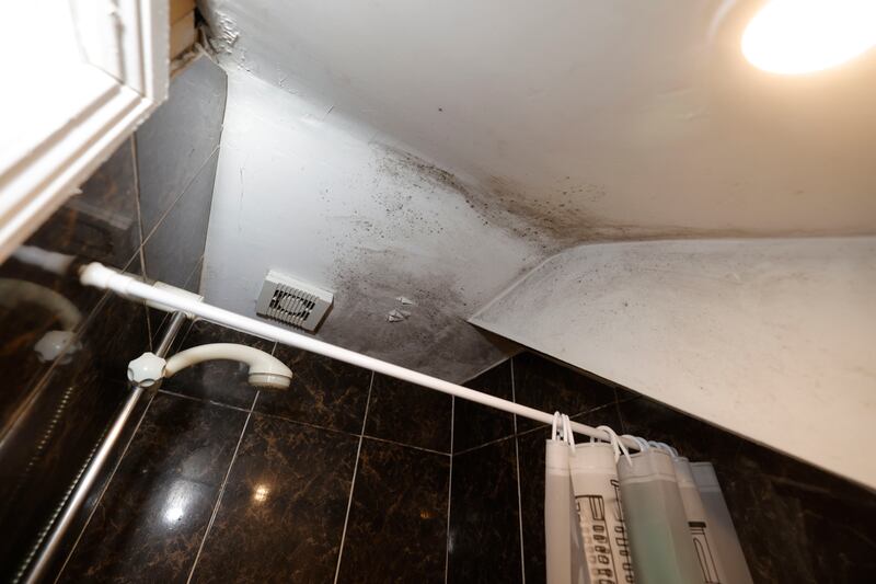 The shower in Andile Ndhlovu's small apartment. Photograph: Alan Betson