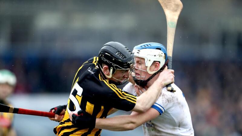 Conor Delaney of Kilkenny and Waterford’s Tom Devine battle it out during the Allianz Hurling League Division 1A game at Walsh Park. Photograph: Bryan Keane/Inpho