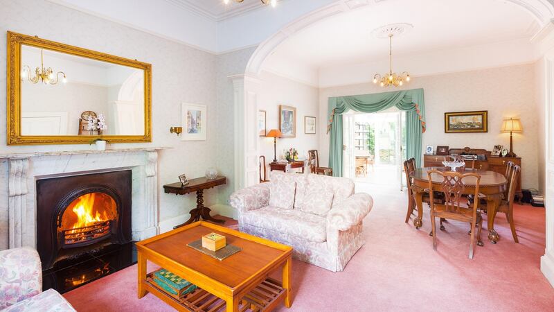 One of 9 Mulgrave Terrace’s most striking features is a huge, wide arch connecting the drawing room – with its large marble fireplace – at the front of the to the dining room.
