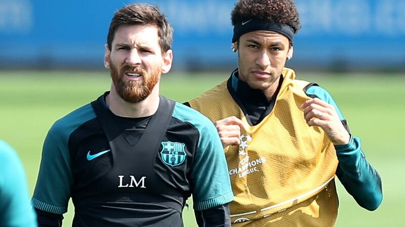 Lionel Messi and Neymar during training at Joan Gamper training camp. Photograph: Reuters