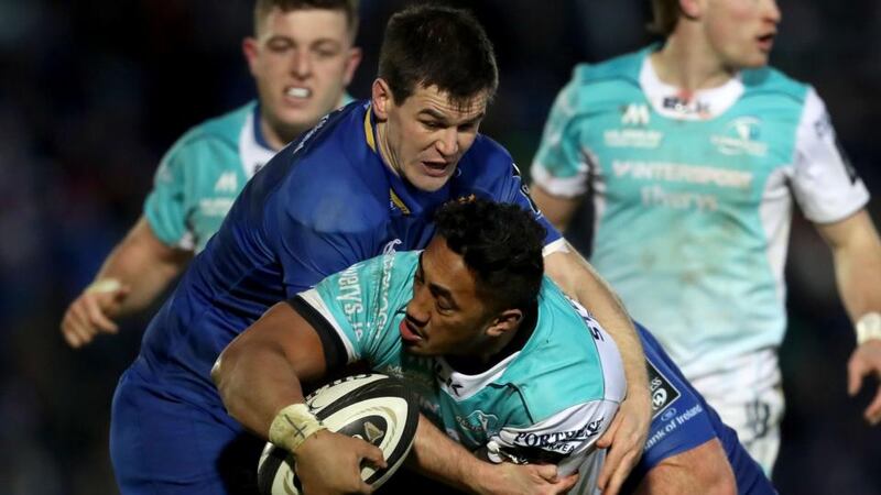 Johnny Sexton tackles Bundee Aki during Leinster’s win over Connacht. Photograph: Bryan Keane/Inpho