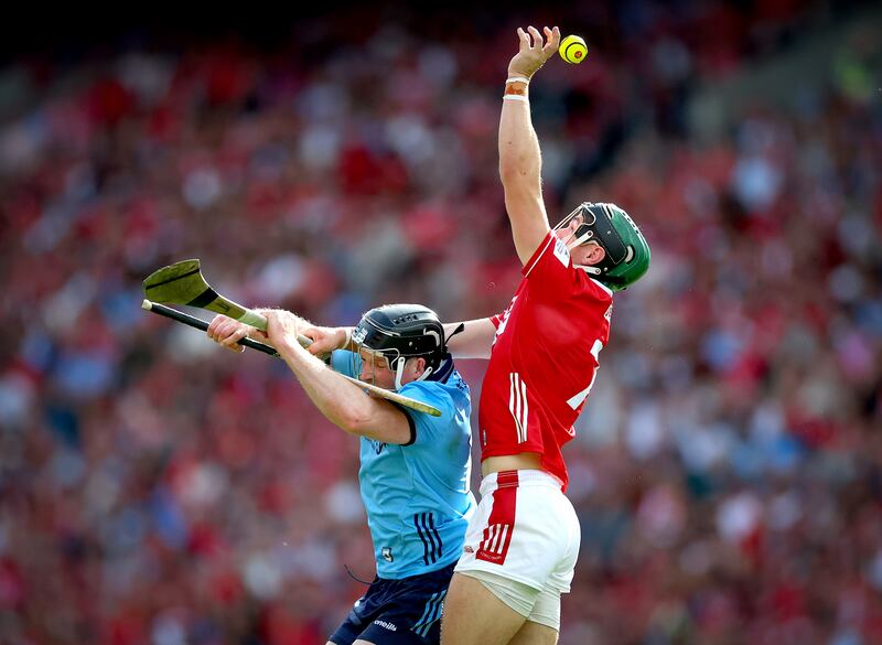 Dublin’s Cian O'Sullivan challenges Cork's Mark Coleman. Photograph: James Crombie/Inpho
