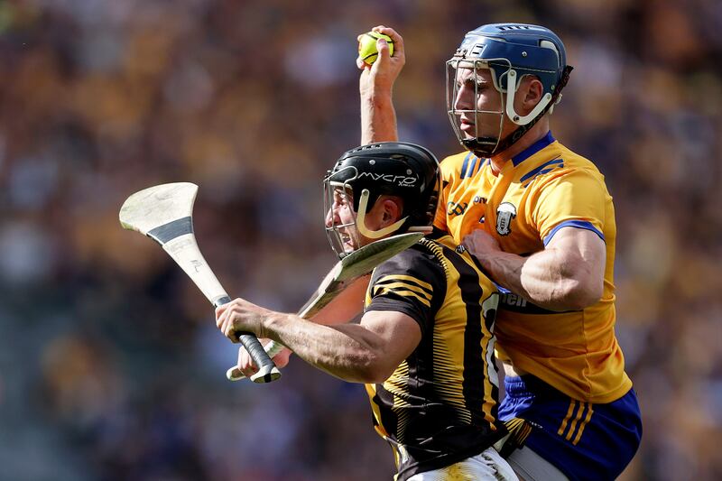 Mikey Butler of Kilkenny holds off Rory Hayes of Clare. Photograph: Laszlo Geczo/INPHO