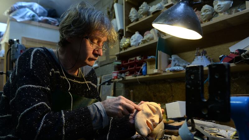 Liam Lambert carving a puppet at the Lambert Puppet Theatre workshop. Photograph: Cyril Byrne/The Irish Times