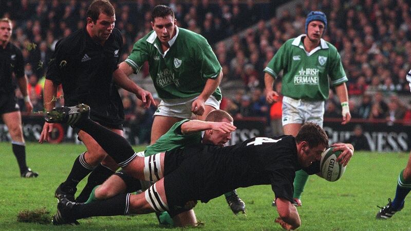 Chris Jack  scores a try as Peter Stringer of Ireland tries to stop him in 2001. Photograph: Lorraine O’Sullivan/Inpho