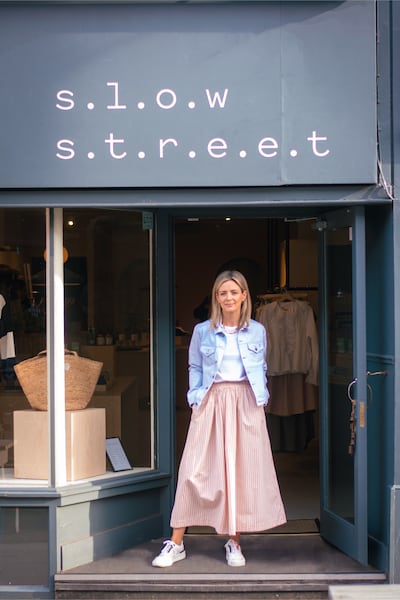 Evelyn Bourne at the entrance to her shop Slow Street