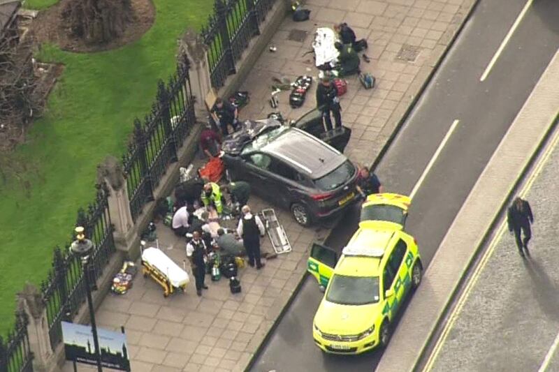 A screengrab taken on March 22, 2017 from footage from an ITN helicopter shows members of the emergency services working at the scene of the terror attack at the Houses of Parliament in central London. Photograph: AFP/Getty Images