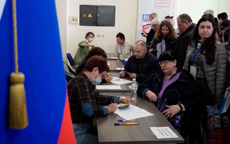 Residents arrive at a polling station in Rostov-on-Don on Saturday. Photograph: Stringer/AFP via Getty Images