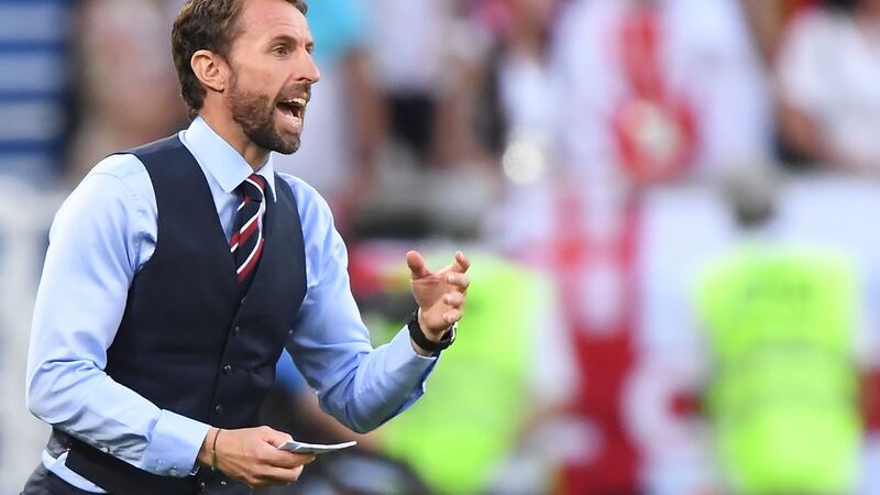 England manager Gareth Southgate and his trademark waistcoat. Photograph: Attila Kisbenedek/AFP
