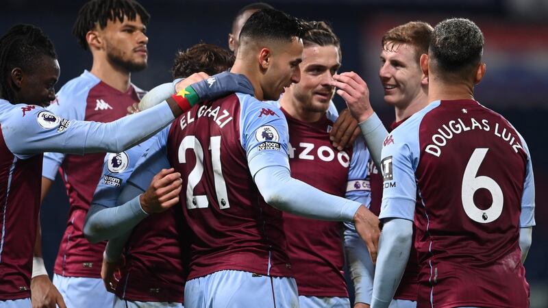 Aston Villa celebrate their third goal at West Brom. Photograph: EPA
