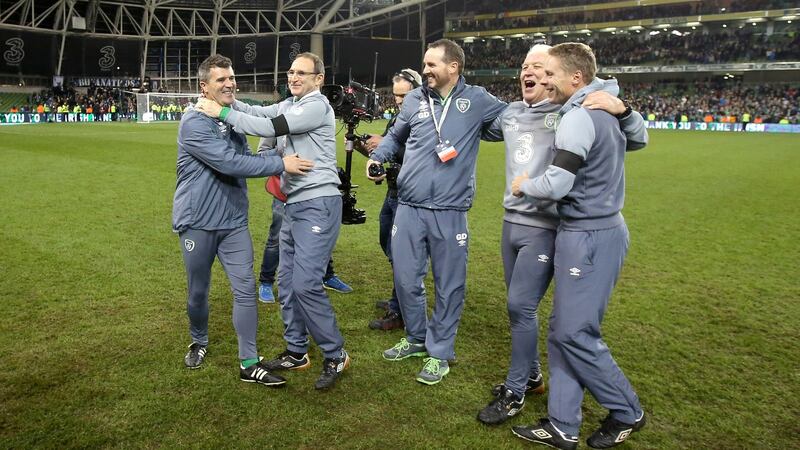 O’Neill and Keane celebrate after beating Bosnia and Herzegovina to qualify for Euro 2016. Photo: Cathal Noonan/Inpho