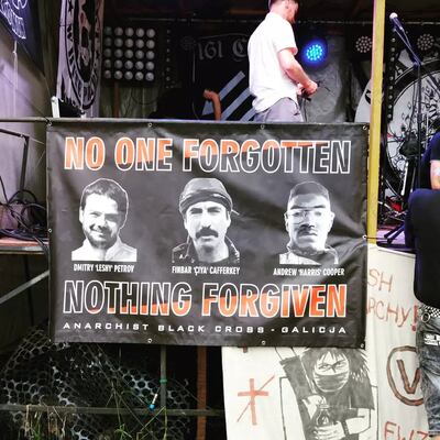 A banner at a recent music festival in Poland showing Russian anarchist activist Dmitry "Leshiy" Petrov, Achill man Finbar Cafferkey and former US marine Cooper "Harris" Andrews, who were killed together in April. Photograph courtesy of ACK Galicja