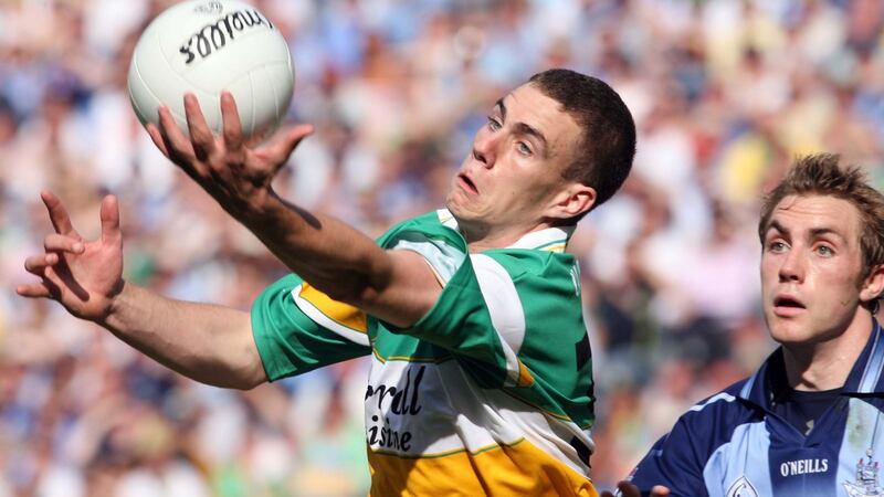 Offaly’s Niall McNamee reaches for a loose ball ahead of Dublin’s Paul Griffin in the 2006 Leinster final. Photograph: Cathal Noonan/Inpho