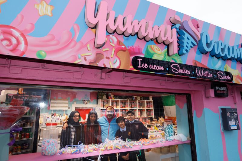 Ednan Hameed with his wife, Sobia, and children, Ayesha (15), Tayyab (10) and Saad (13),  who have all helped to run the shop. Photograph: Alan Betson
