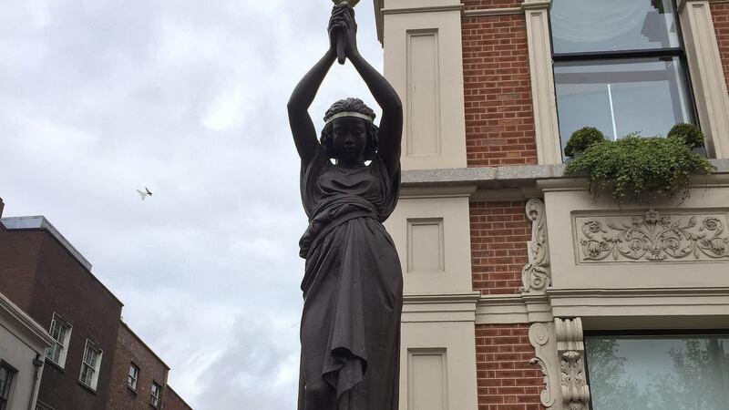 One of the statues  depicting slave girls holding torches. Photograph: Wikimedia Commons