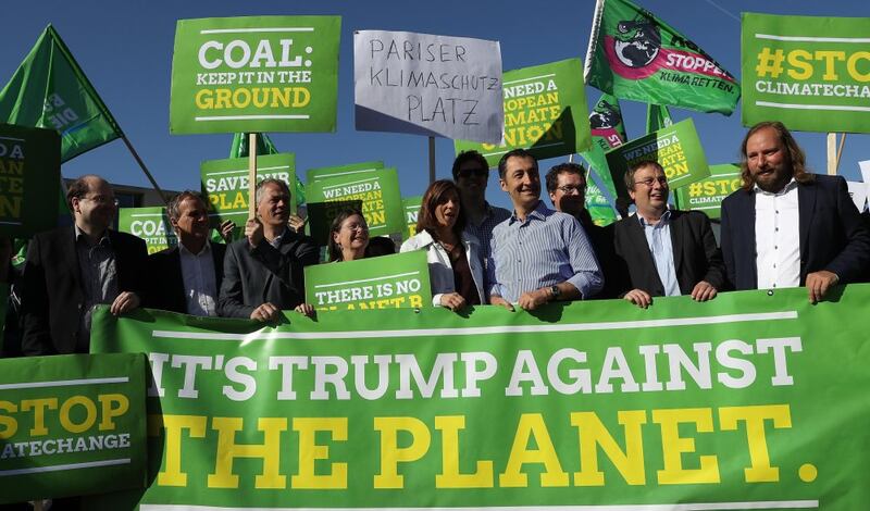 Members of the German Greens Party protest outside the US Embassy against the decision by Donald Trump to pull out of the Paris accord. Photograph: Getty images