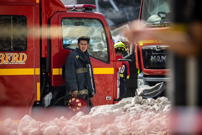 Myanmar and Thailand earthquake: Thai rescue workers arrive on scene at a construction building collapse in the Chatuchak area. Photograph: Lauren Decicca/Getty Images News