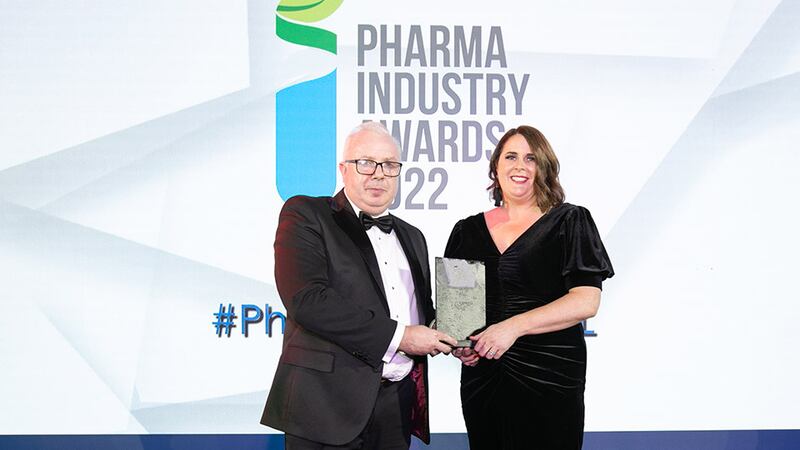 Daran Smith, Sales Director, AirconMech, presents the COVID-19 Crisis Response Award to Claire Lee, United Drug.