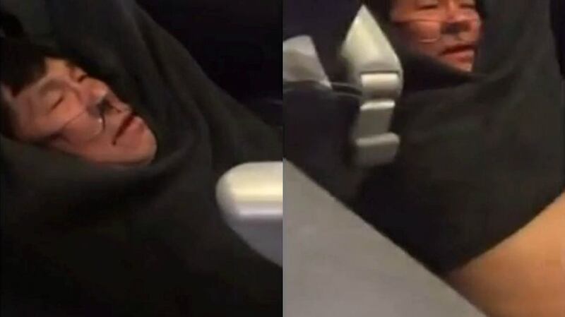 A video screengrab shows passenger David Dao being dragged off a United Airlines flight at Chicago O’Hare International Airport. Photograph: Jayse D Anspach/Reuters