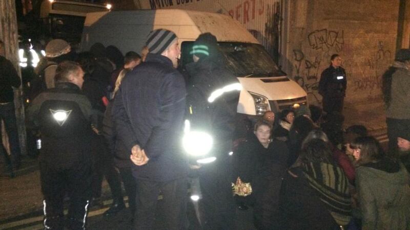 Protesters sitting in front of a van during the stand-off on Grangegorman Road Lower. Photograph: Dan Griffin