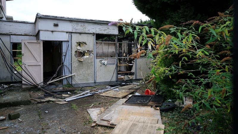 One of the buildings  at the rear of the main house showing extensive fire damage. Photograph: Nick Bradshaw