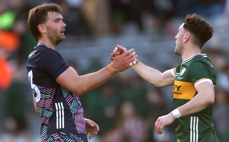 Mayo’s Aidan O'Shea and Kerry's Pauide Clifford after the final whistle. Photograph: James Crombie/Inpho
